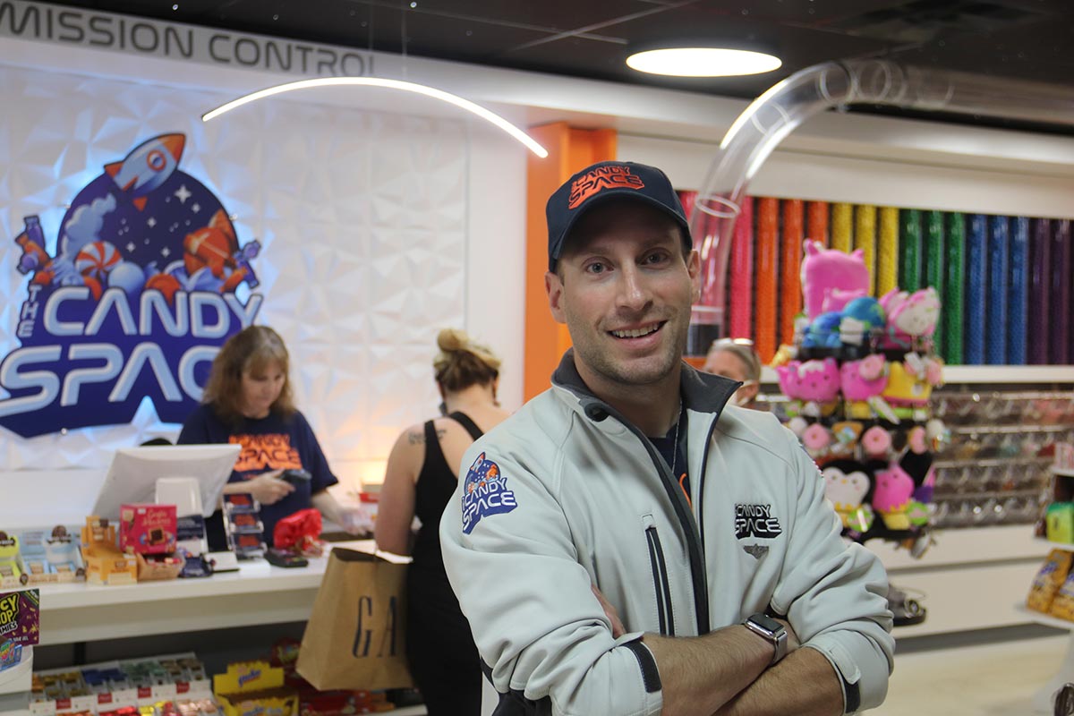 Chad standing in front of Mission Control