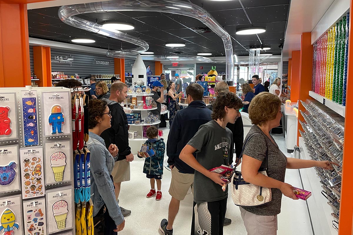 Shoppers picking from our over 180 different bulk candies