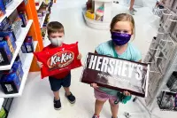 Kids with Giant Candy Bars